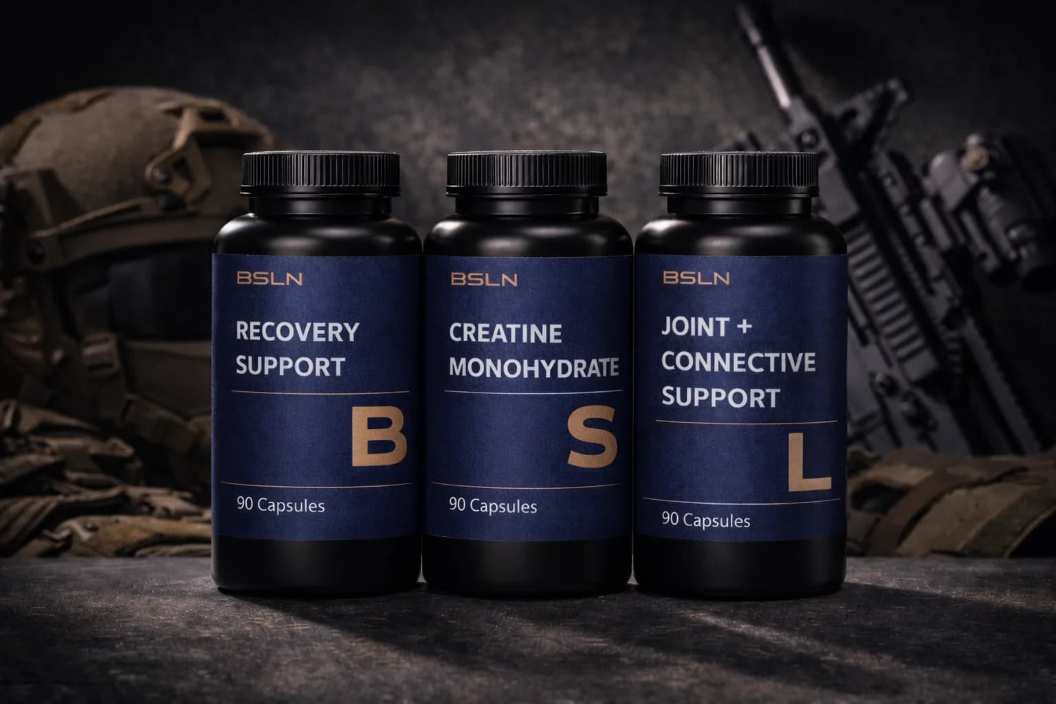 BSLN supplement bottles arranged on dark stone surface with dramatic side lighting